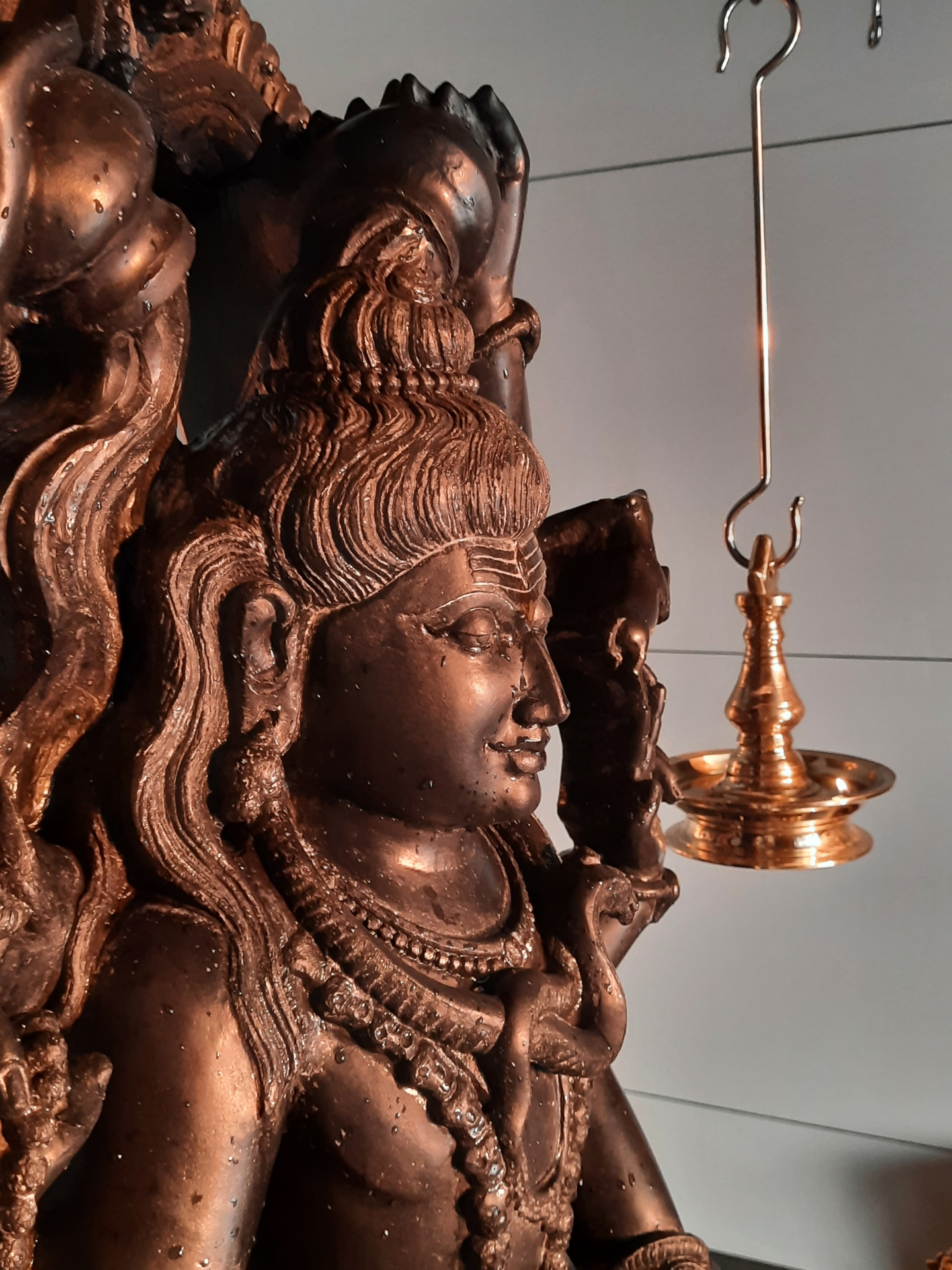 Sacred bronze murti detail